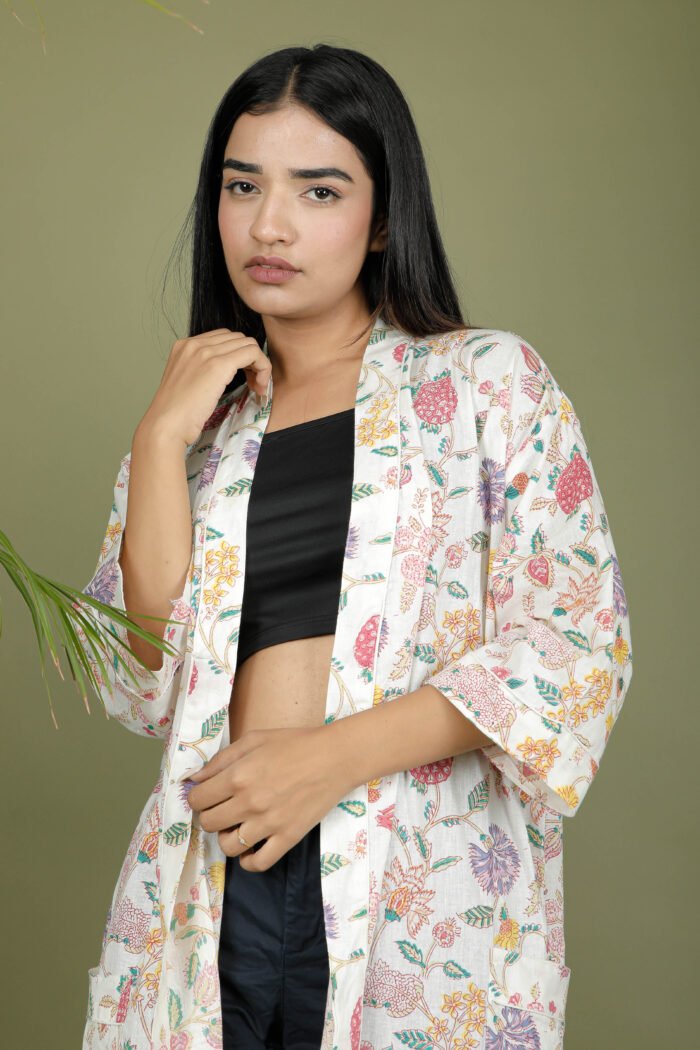 model wearing floral print white color kimono traditional on olive green background