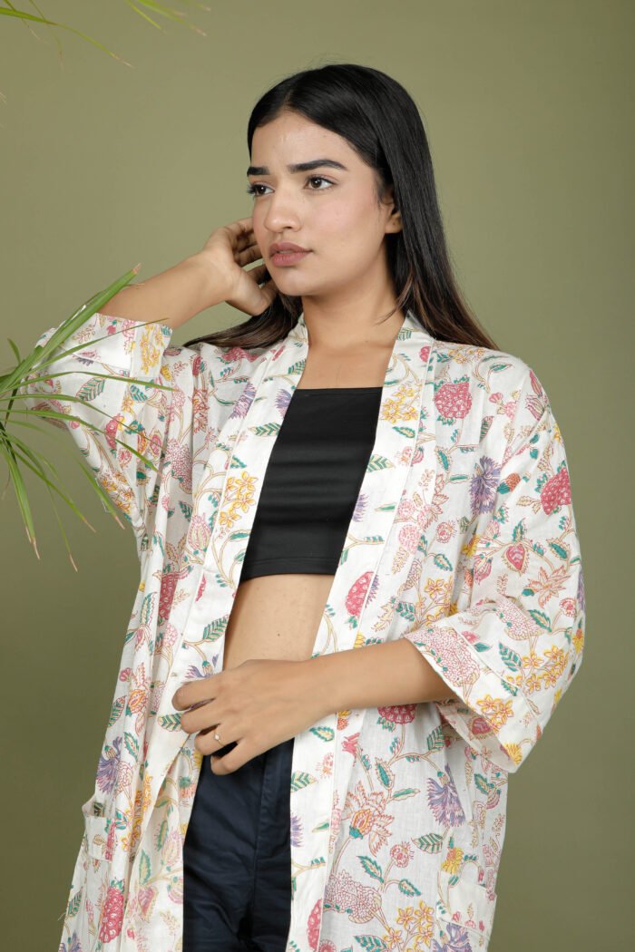 model wearing floral print white color kimono traditional on olive green background