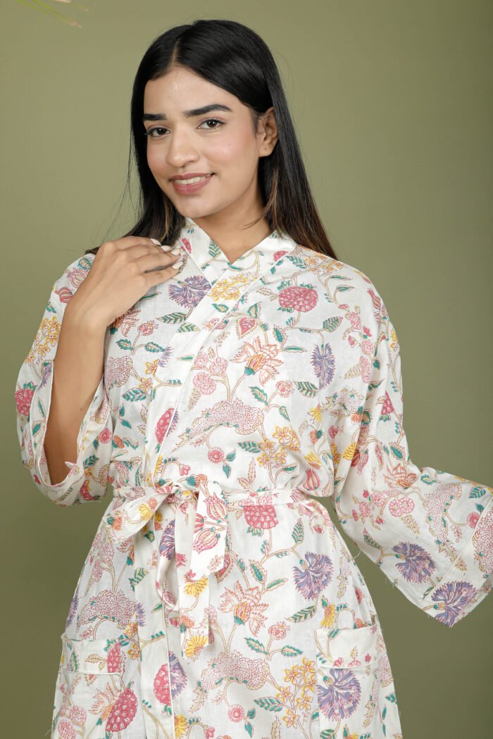 model wearing floral print white color kimono traditional on olive green background