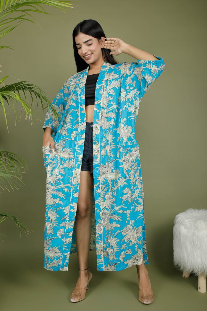 model wearing floral print blue color traditional kimono on olive green background