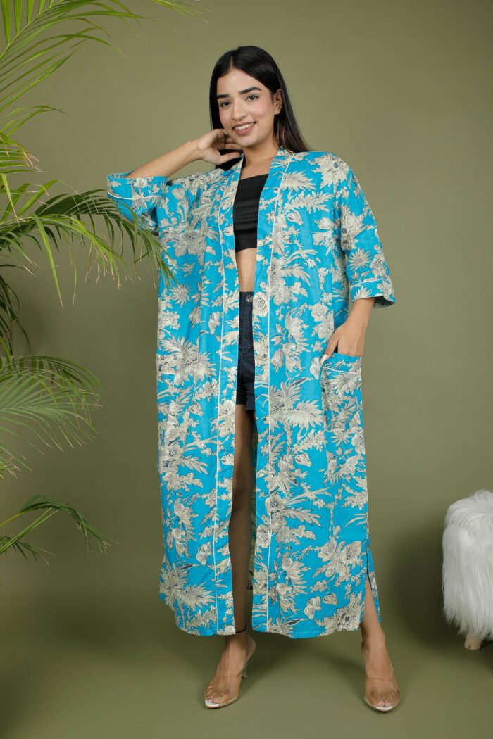 model wearing floral print blue color traditional kimono on olive green background