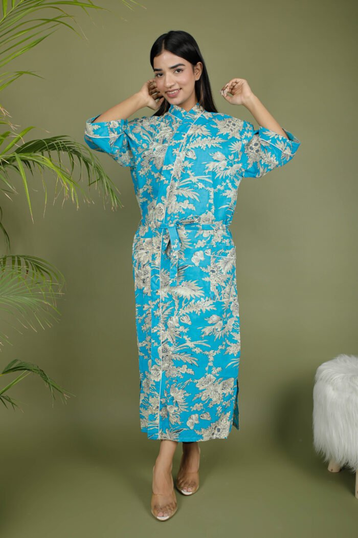 model wearing floral print blue color traditional kimono on olive green background