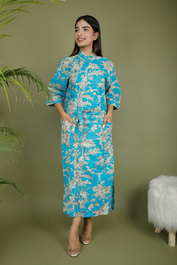 model wearing floral print blue color traditional kimono on olive green background