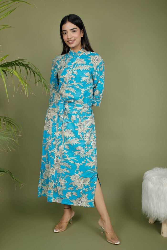 model wearing floral print blue color traditional kimono on olive green background