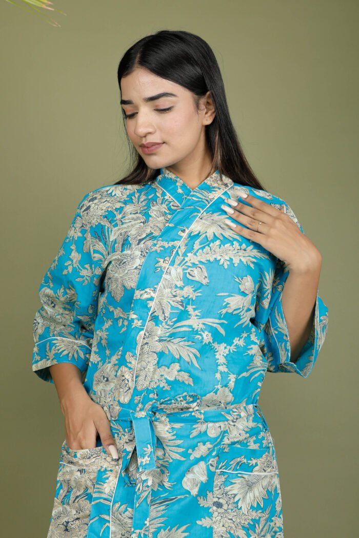 model wearing floral print blue color traditional kimono on olive green background