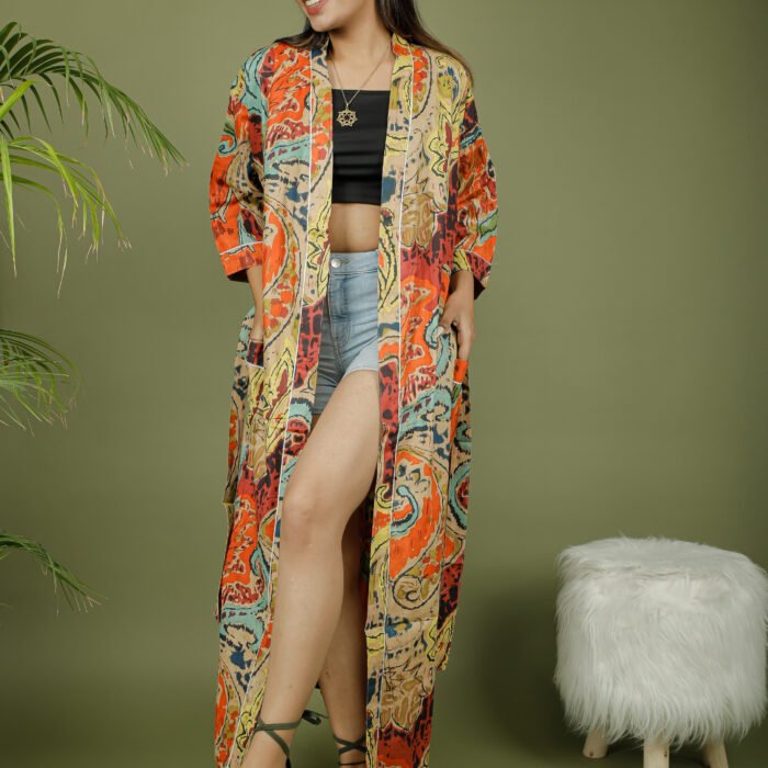 model wearing floral print orange color kimono dress female on olive green background