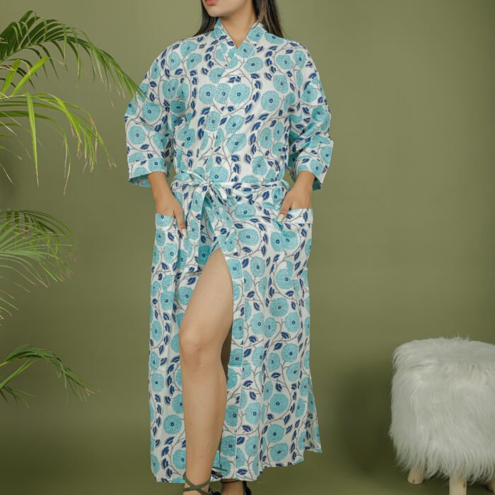 model wearing floral print sky blue color kimono shrug on olive green background