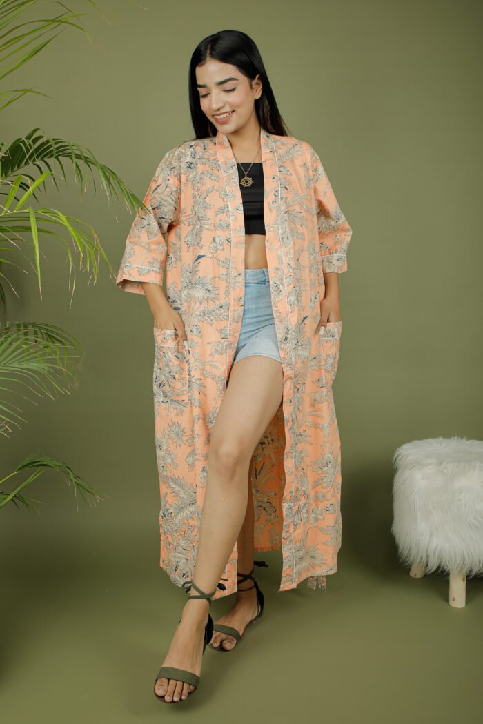 model wearing floral print beige color kimono on olive green background