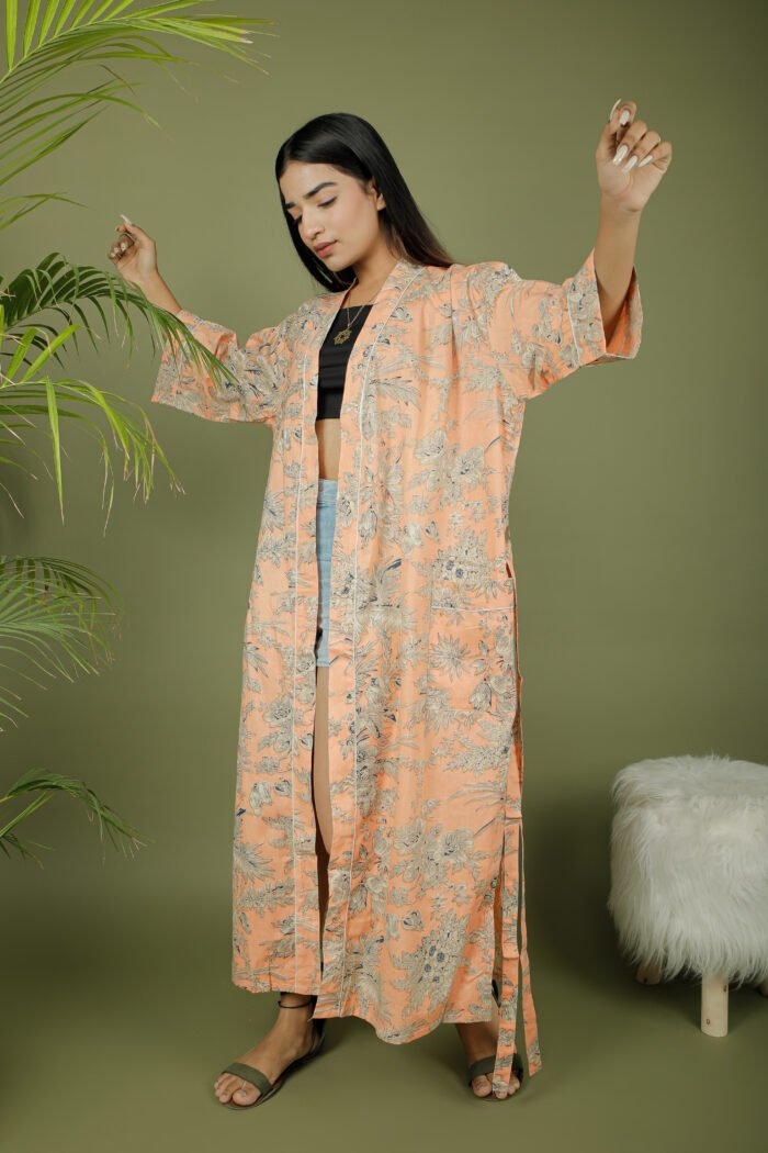 model wearing floral print beige color kimono on olive green background