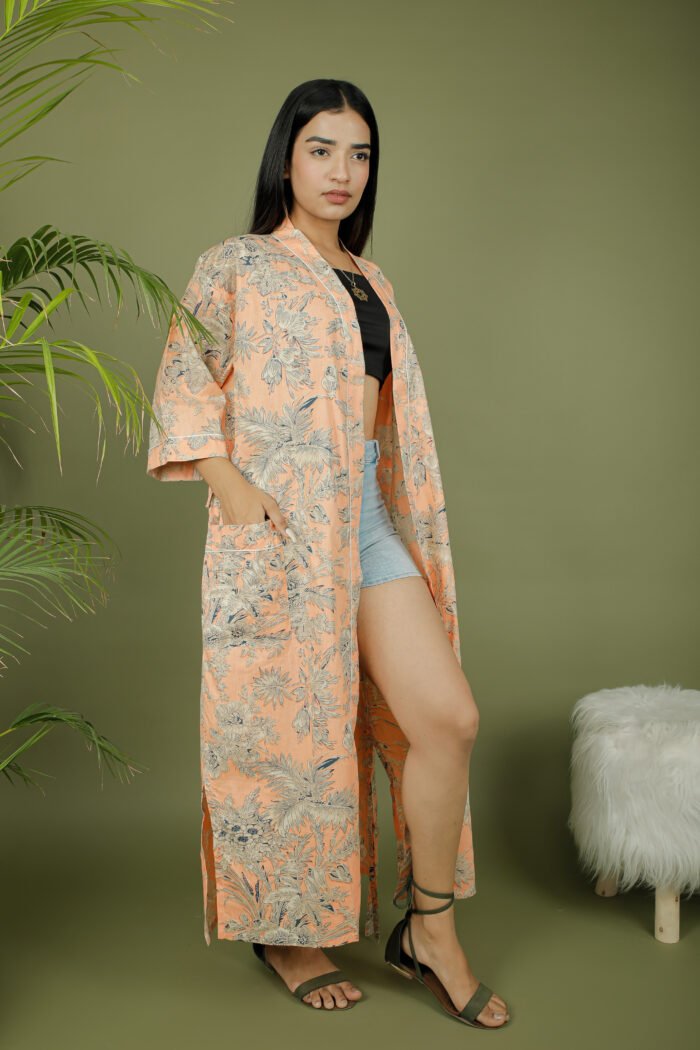 model wearing floral print beige color kimono on olive green background