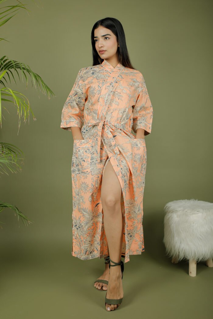 model wearing floral print beige color kimono on olive green background