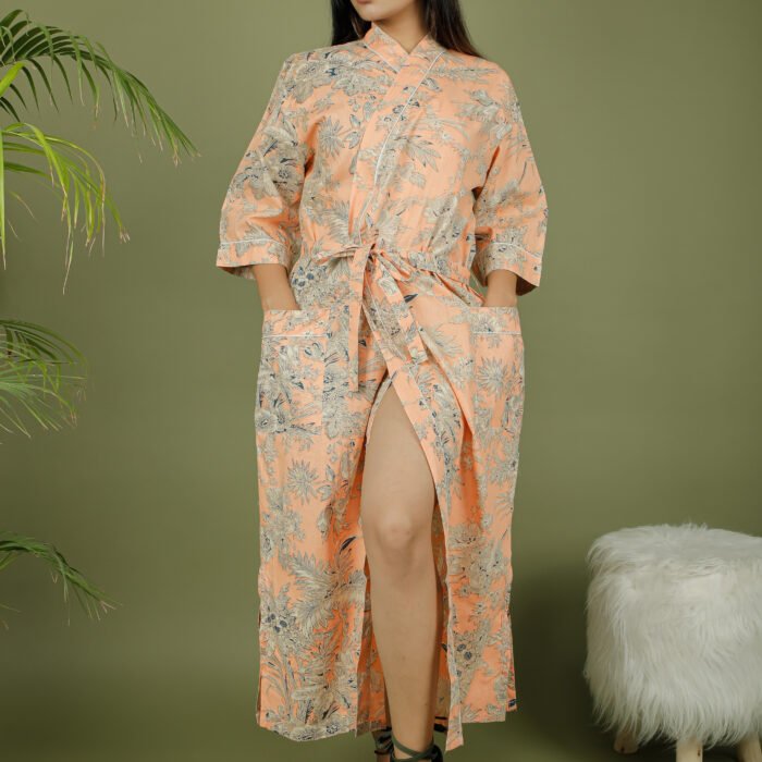 model wearing floral print beige color kimono on olive green background