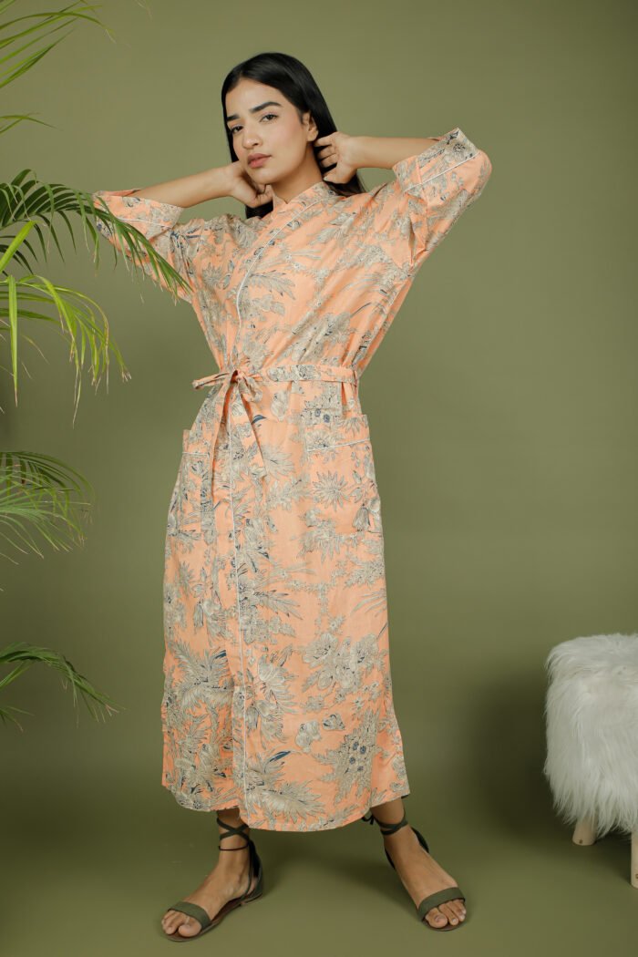 model wearing floral print beige color kimono on olive green background