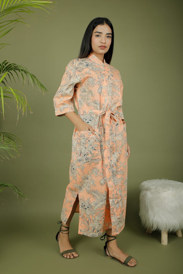 model wearing floral print beige color kimono on olive green background