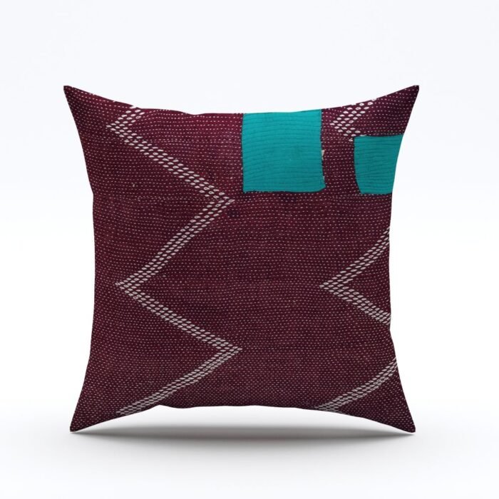 block print brown pillow cover on white background